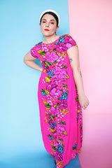 Women's vintage 1960's Skirts & Blouses Specialty Shop Honolulu label short sleeve ankle length bright pink cotton material dress with all over Hawaiian floral print.