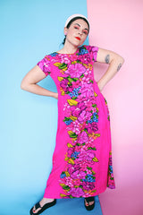 Women's vintage 1960's Skirts & Blouses Specialty Shop Honolulu label short sleeve ankle length bright pink cotton material dress with all over Hawaiian floral print.