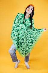 green crochet knit poncho with fringed hem vintage 1970's