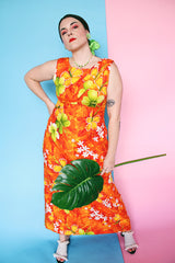 Women's vintage 1970's ears Hawaiian Fashions label sleeveless cotton material ankle length orange dress with all Hawaiian floral print.