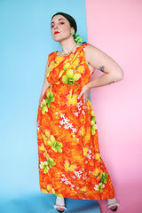 Women's vintage 1970's ears Hawaiian Fashions label sleeveless cotton material ankle length orange dress with all Hawaiian floral print.