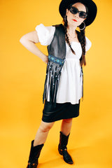 sleeveless black leather vest with beaded fringe hem vintage women's