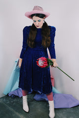 Women's vintage 1960's long sleeve midi length blue velvet dress with slight puff sleeves