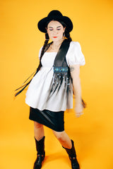 sleeveless black leather vest with beaded fringe hem vintage women's