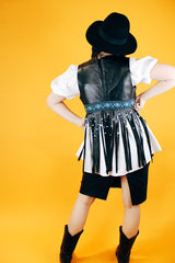 sleeveless black leather vest with beaded fringe hem vintage women's