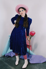 Women's vintage 1960's long sleeve midi length blue velvet dress with slight puff sleeves