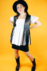 sleeveless black leather vest with beaded fringe hem vintage women's