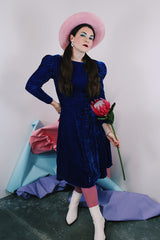 Women's vintage 1960's long sleeve midi length blue velvet dress with slight puff sleeves