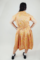 short sleeve midi length orange and pink paisley print a line dress vintage 1950's