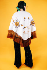 white triangle shawl with brown crochet fringe trim and embroidered flowers vintage 1970's