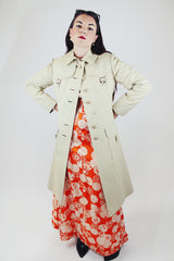 long sleeve knee length light tan trench with gold hardware vintage 1970's saks alley