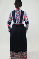 long sleeve v neck maxi dress in black with paisley print vintage 1970's
