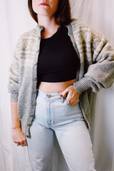 long sleeve grey and cream norwegian sweater vintage with round silver button closure