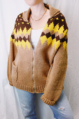 long sleeve zip up cowichan style sweater in camel brown with dark brown and yellow print around neck