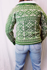 long sleeve norwegian vintage sweater in a green and cream print with silver metal buttons