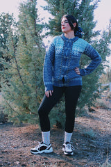 long sleeve wool 1980's blue printed Norwegian sweater with metal clasp closures in the front