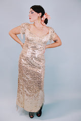 short sleeve ankle length gold sequined evening dress with beaded fringe trim