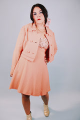 salmon colored 1960's vintage dress and jacket set dress is sleeveless and has beaded top