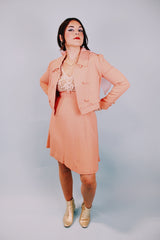 salmon colored 1960's vintage dress and jacket set dress is sleeveless and has beaded top