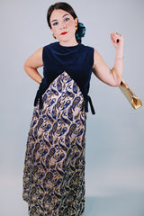 vintage 1970's sleeveless ankle length dress with navy velvet top half and gold metallic paisley printed bottom half