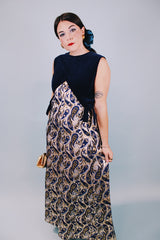 vintage 1970's sleeveless ankle length dress with navy velvet top half and gold metallic paisley printed bottom half