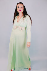 women's vintage 1970's teal floor length long sleeve evening dress with silver beaded details and ribbon with bow around waist