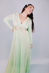 women's vintage 1970's teal floor length long sleeve evening dress with silver beaded details and ribbon with bow around waist