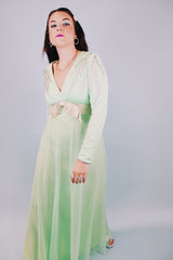 women's vintage 1970's teal floor length long sleeve evening dress with silver beaded details and ribbon with bow around waist