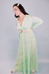 women's vintage 1970's teal floor length long sleeve evening dress with silver beaded details and ribbon with bow around waist