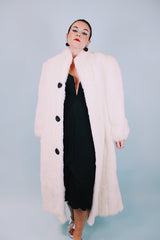 long sleeve ankle length vintage 1980's white faux fur coat with black buttons and mandarin collar