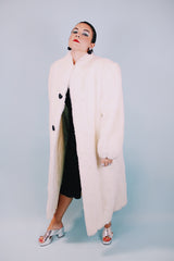 long sleeve ankle length vintage 1980's white faux fur coat with black buttons and mandarin collar
