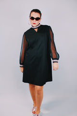 long sleeve mini black party dress with sheer sleeves and silver metallic trim 1960's vintage