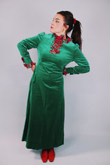 long sleeve ankle length green velvet dress with red tartan ruffles around collar and cuffs 1960's vintage