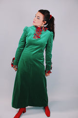 long sleeve ankle length green velvet dress with red tartan ruffles around collar and cuffs 1960's vintage