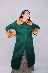 knee length long sleeve wool green coat with brown faux fur collar and trim on cuffs 1940's vintage