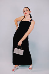 ankle length black velvet form fitting dress sleeveless with one thick strap and one thin strap and rhinestone buckle 1970's vintage