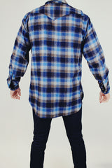 men's vintage long sleeve pendleton wool button up shirt in blue plaid with popper buttons