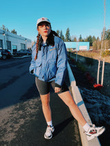 navy blue puffer jacket with black faux fur collar and zipper up the front 1970's vintage