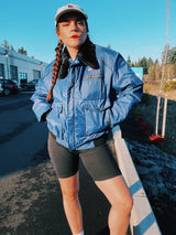 navy blue puffer jacket with black faux fur collar and zipper up the front 1970's vintage