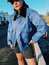 navy blue puffer jacket with black faux fur collar and zipper up the front 1970's vintage