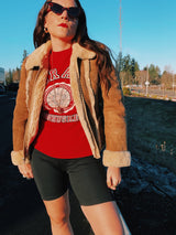 long sleeve brown suede jacket with cream shearling liner and collar zips up the front vintage 1970's