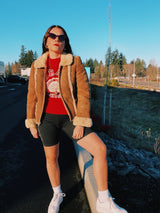 long sleeve brown suede jacket with cream shearling liner and collar zips up the front vintage 1970's