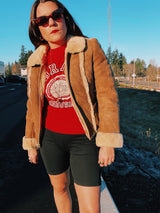 long sleeve brown suede jacket with cream shearling liner and collar zips up the front vintage 1970's