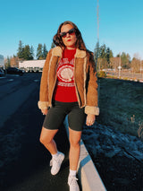 long sleeve brown suede jacket with cream shearling liner and collar zips up the front vintage 1970's