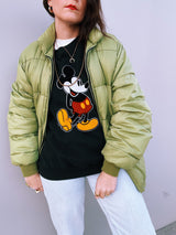 long sleeve vintage 1970's army green puffer jacket that zips up the front