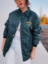 long sleeve black nylon jacket with fleece interior and East Staff wording on chest