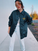 long sleeve black nylon jacket with fleece interior and East Staff wording on chest