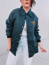 long sleeve black nylon jacket with fleece interior and East Staff wording on chest