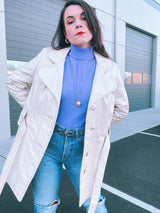 long sleeve mid length cream leather trench coat vintage 1970's with front buttons and tie waists