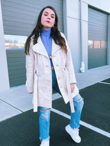 long sleeve mid length cream leather trench coat vintage 1970's with front buttons and tie waists